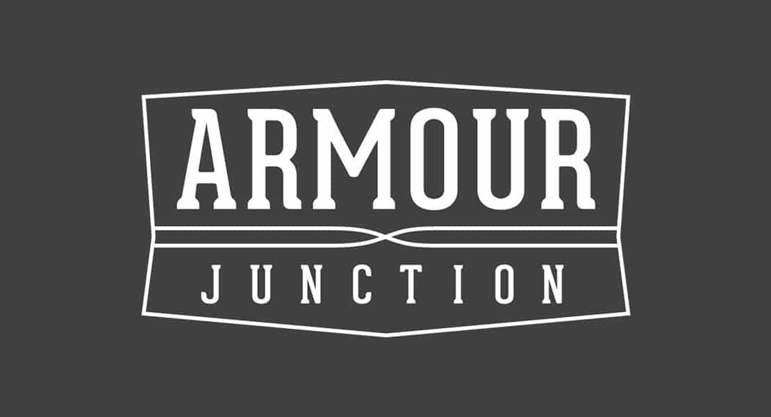 Armour Junction logo, grey and white