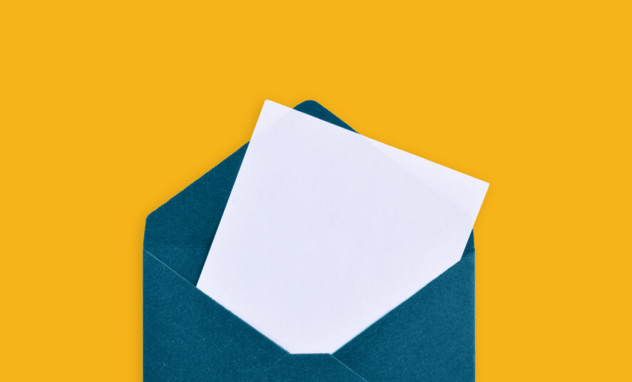 A blue envelope with a blank sheet of paper inside, against a yellow background
