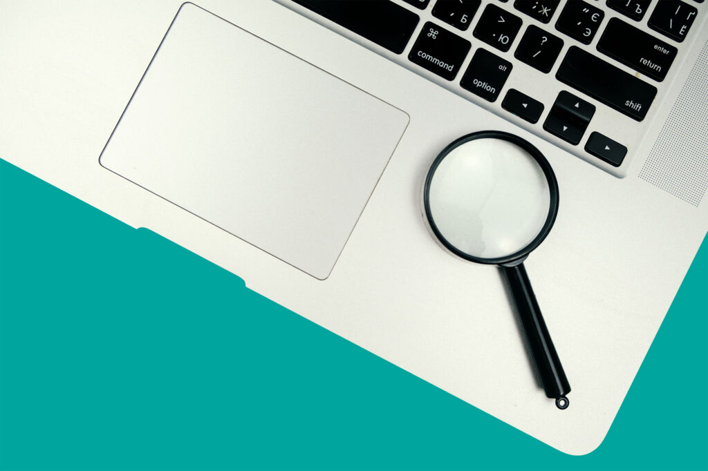 Magnifier on the laptop keyboard, close up
